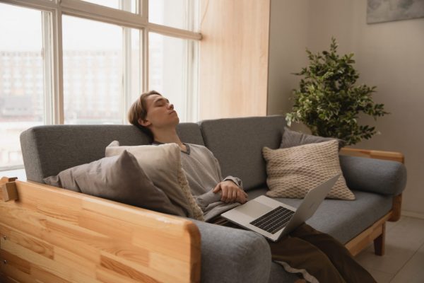 Canva - Photo Of Man Sleeping On Sofa